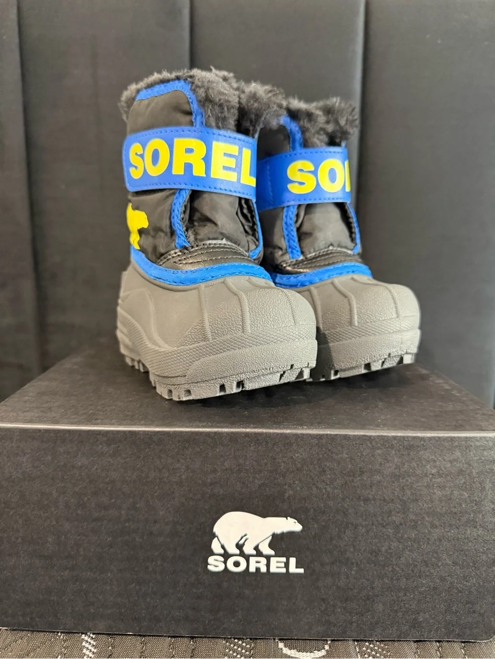 Sorel Kids Black and Blue Snow Boots with Yellow Logo
